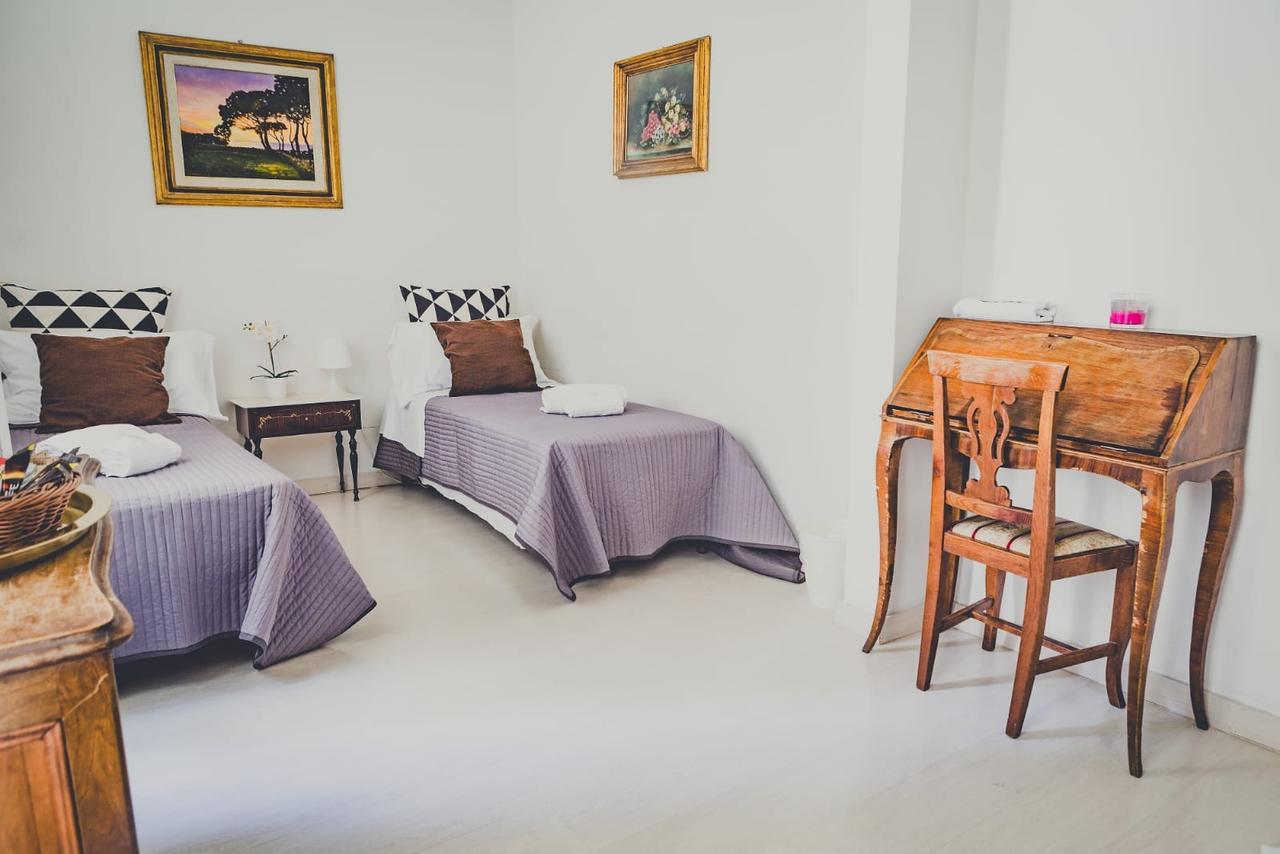 Tweepersoonskamer met 1 of 2 Bedden en Gedeelde Badkamer